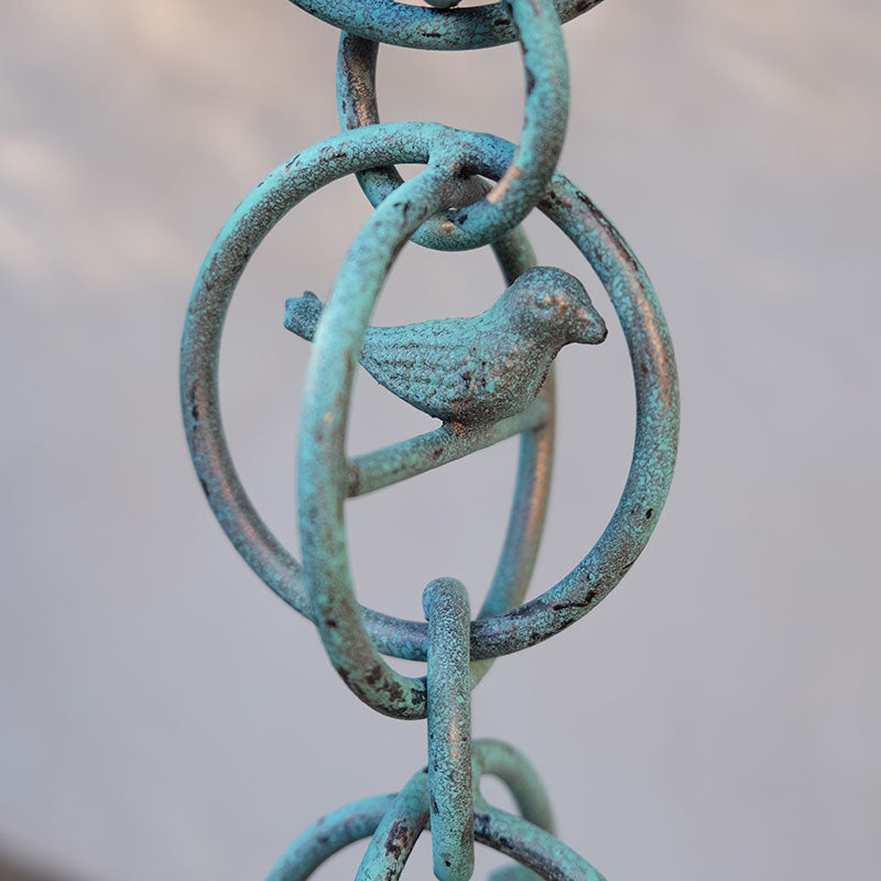 Bird in a Cage Rain Chain closeup of weathered aluminum chain link