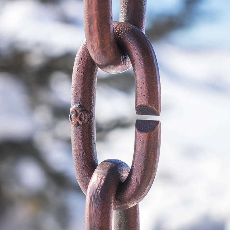 Closeup of Cast Oval Links Rain Chain in copper