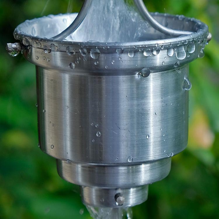 Aluminum Naoki Cups Rain Chain with water flowing through cup